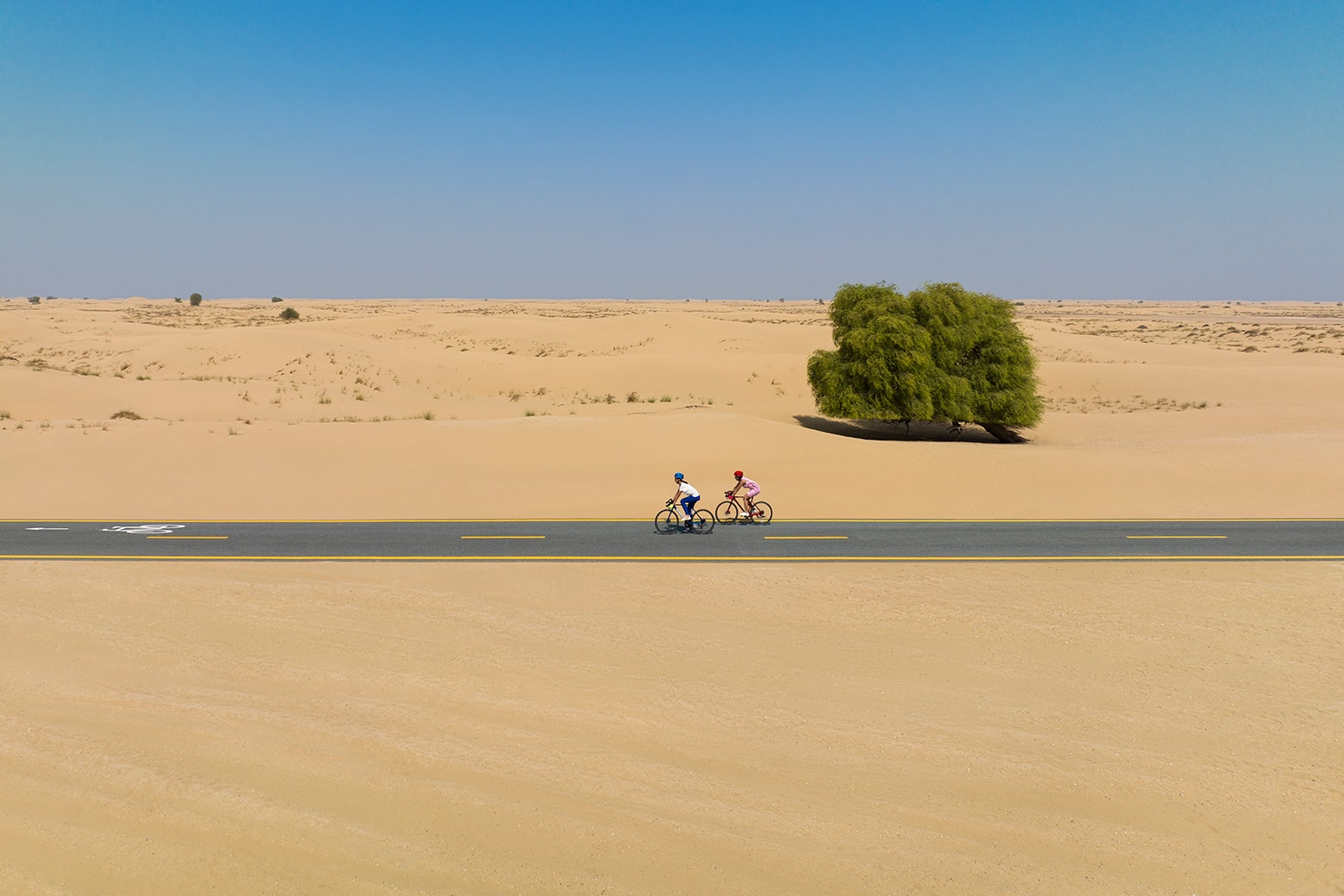 a guide to cycling in dubai al qudra header