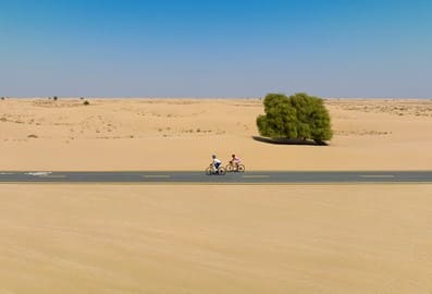 a guide to cycling in dubai al qudra header
