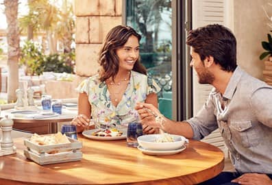 Couple dining at restaurant in Dubai