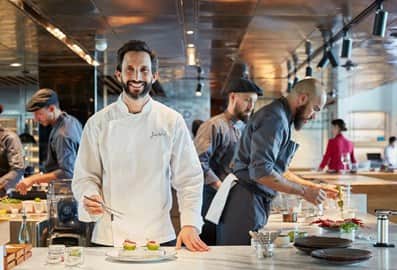 Chef José Avillez and his team in the open kitchen at Tasca restaurant