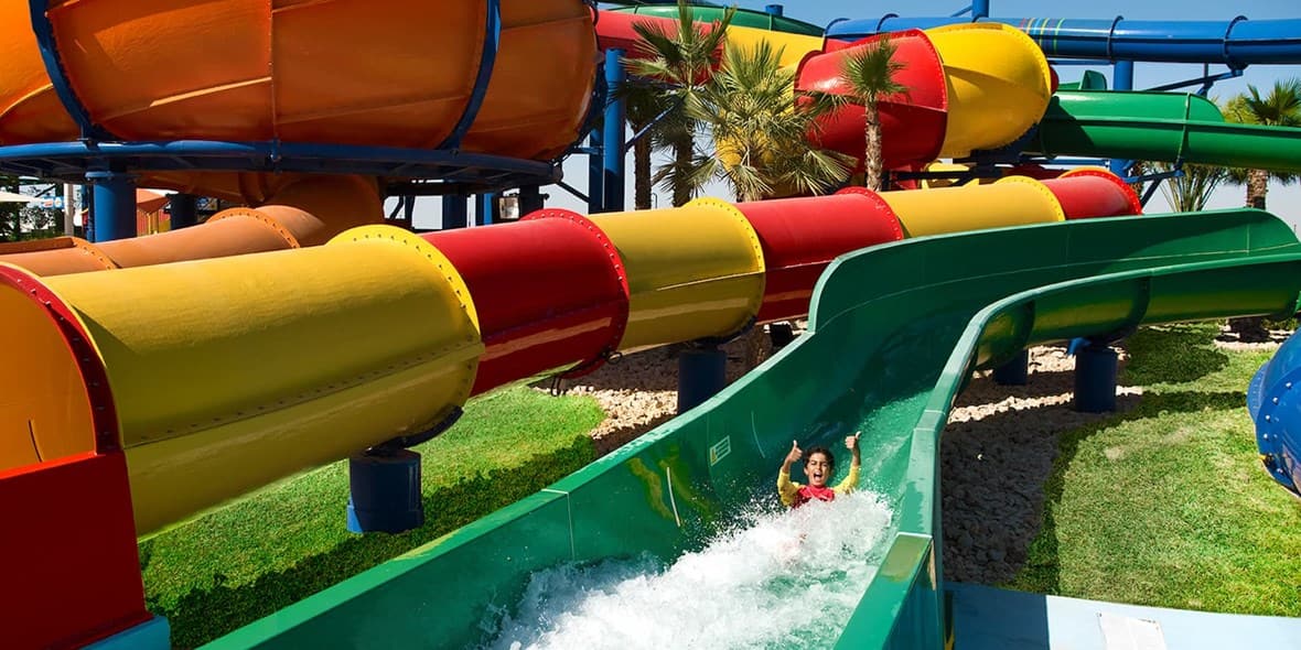 child enjoying legoland wave rider slide