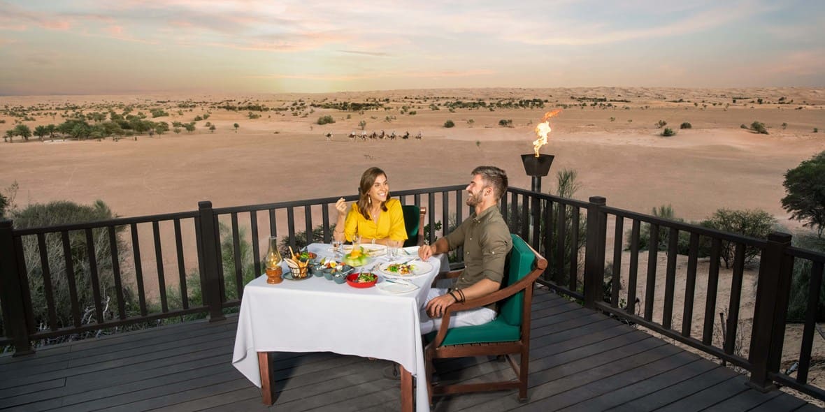 dubais-most-romantic-hotels-al-maha-dine-couple-7