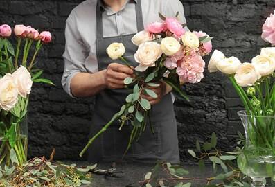 Flower deliveries in Dubai Florist arranging flowers