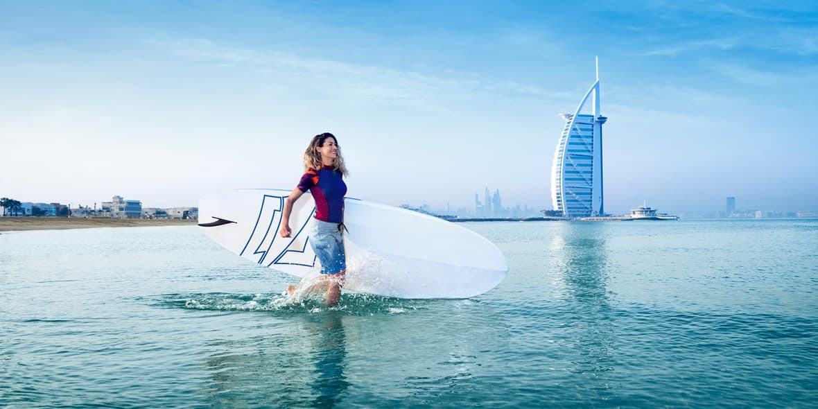 how-to-save-money-on-your-dubai-holiday-beach-paddleboard-dtcm-6