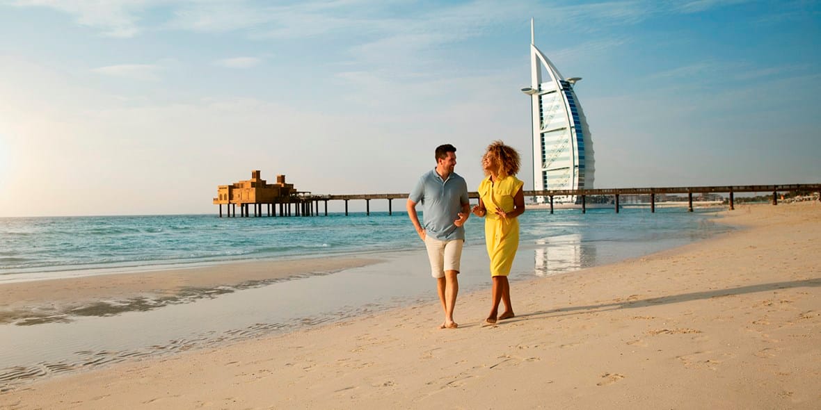 Couple strolling in Al Sufouh Beach Dubai
