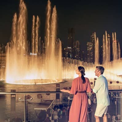 Couple enjoying the Dubai Fountain in Dubai
