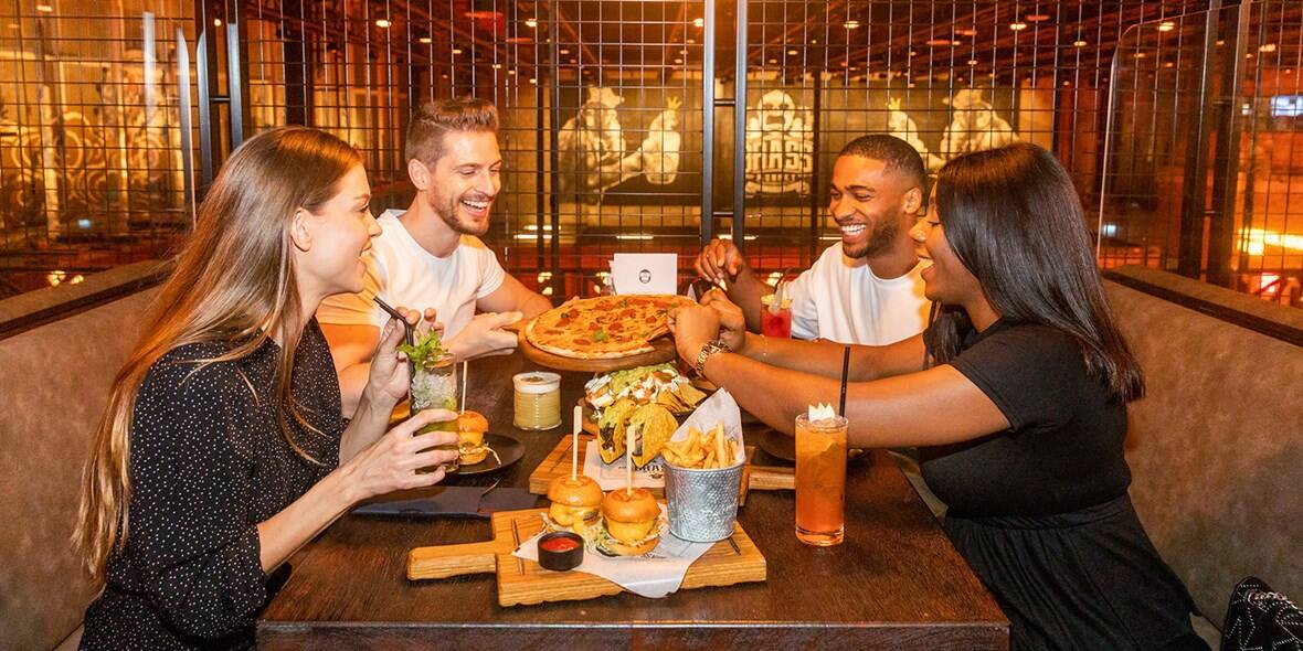 group of friends dining at Brass Monkey