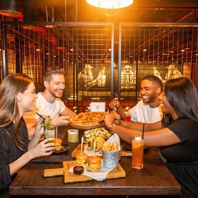 group of friends dining at Brass Monkey