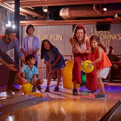 bowling family fun dubai august indoors