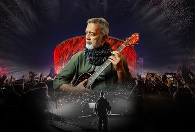 Guitarist performing at a live music event