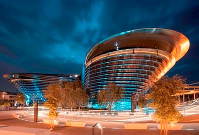 Panoramic view of Alif The Mobility Pavilion at Expo City Dubai at night.