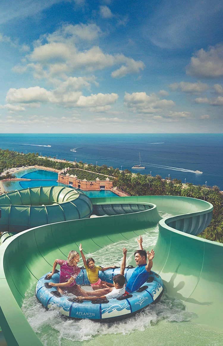 People enjoying waterslides at Aquaventure World Waterpark Dubai