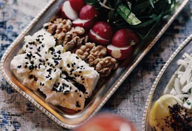 Authentic Persian appetizer platter served on a silver tray at Berenjak restaurant
