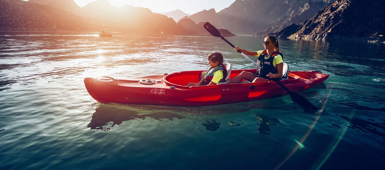 Woman and child kayaking in Hatta Dubai