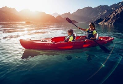 Woman and child kayaking in Hatta Dubai
