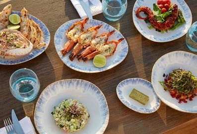 nuska beach dubai table dishes food