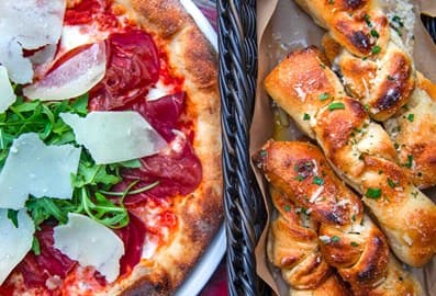Bresaola pizza and signature garlic knots at Pitfire Pizza