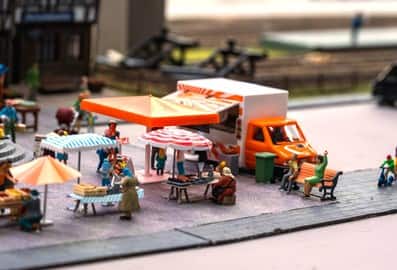 Miniature market stalls and figures at Small Worlds Dubai