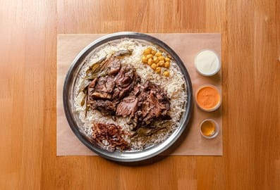 Traditional Emirati meat and rice dish at Tanoor restaurant