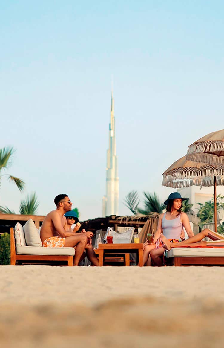 A family relaxing on Jumeirah beach.