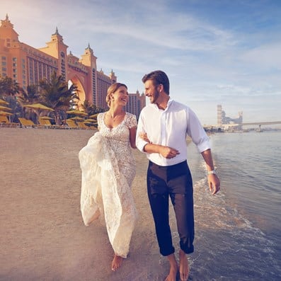 Married couple infront of Atlantis The Palm in Dubai