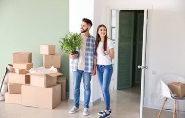 Couple Moving Into New Apartment