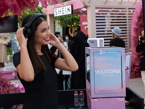 Woman listening on headphones
