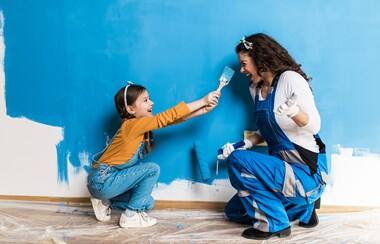 Woman and child painting room