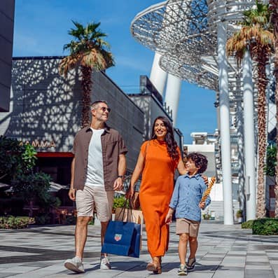 Family walking Bluewaters